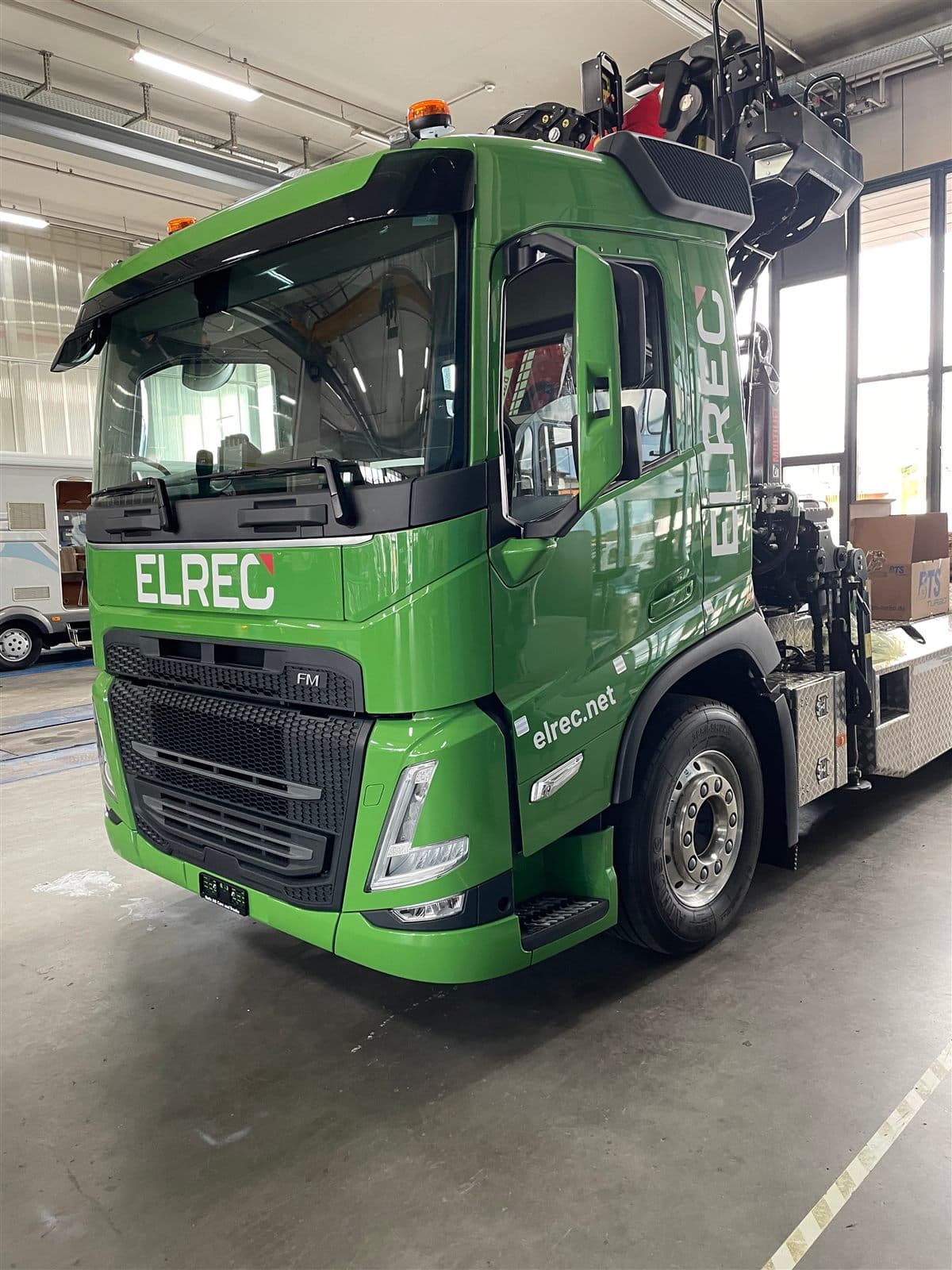 Fahrzeugbeschriftung auf einem LKW für Elrec